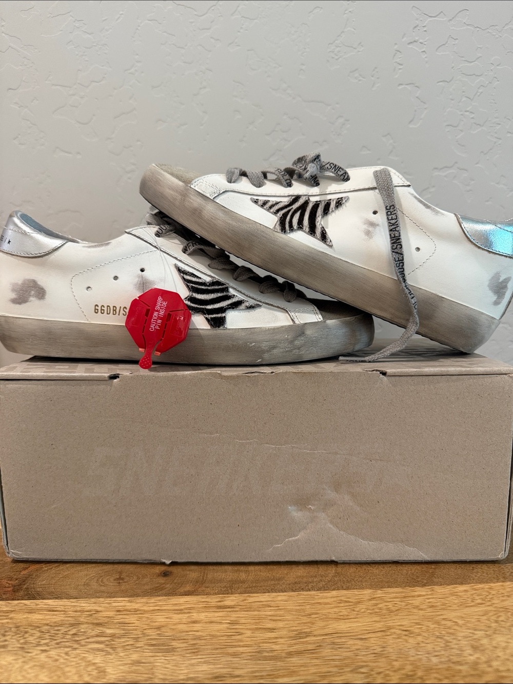 Golden Goose White Sneakers with Black Zebra Accent and Silver Heel Tab